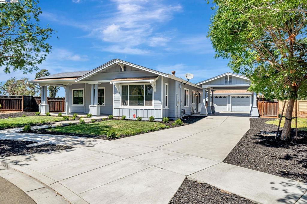 Located in Livermore’s sought-after Jensen neighborhood, 202 Sonia Way is a beautifully refreshed single-story that blends modern finishes with everyday comfort. Inside, wide-plank SPC luxury vinyl flooring, fresh interior/exterior paint, recessed lighting, new doors and closets, and energy-efficient double-pane windows create a bright, easy-living layout. The kitchen shines with all-new cabinetry, quartz counters with a full-height backsplash, stainless steel appliances including a gas range, and a built-in wine cooler. Both bathrooms are fully updated, highlighted by a spa-style primary retreat with a soaking tub. Comfort is turnkey with central A/C and heating, plus a fully paid-off solar system for lasting energy savings. Outside, a drive-in carport pairs with a detached 2-car garage featuring epoxy-coated floors, while the generous backyard offers mature fruit trees—perfect for relaxing or entertaining. Tucked on a quiet street steps from walking trails and multiple community parks, and minutes to shopping conveniences and major freeways, this turnkey home delivers style, efficiency, and prime Livermore living.