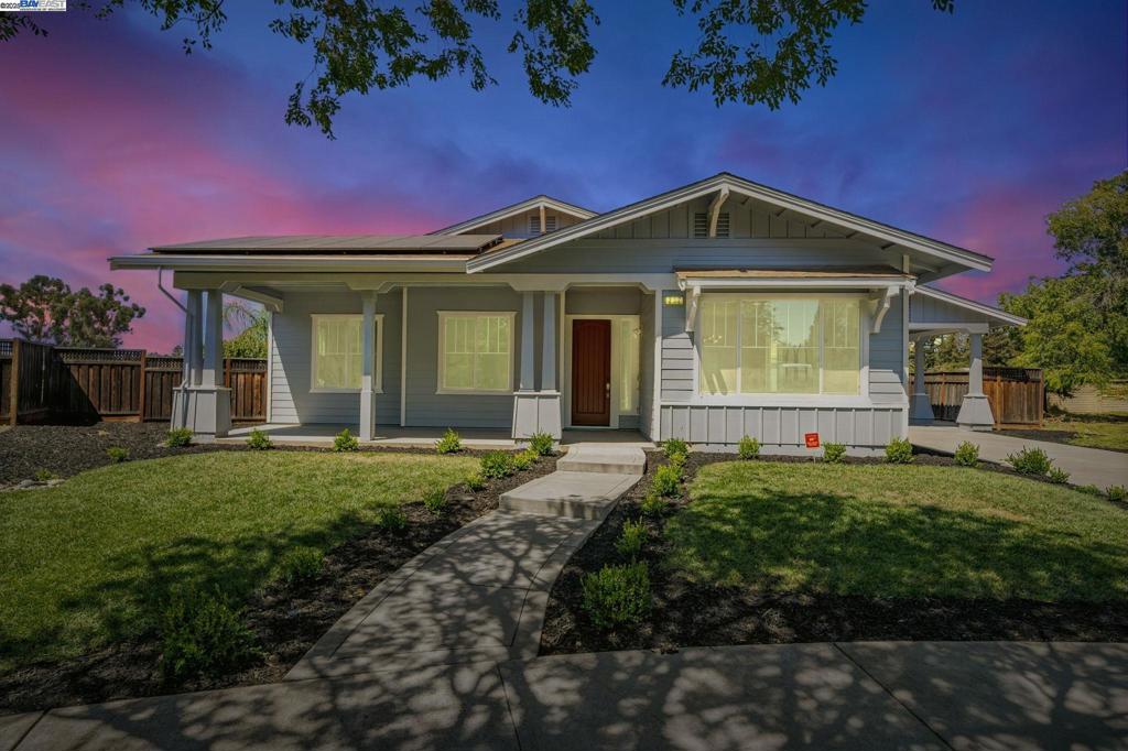 Located in Livermore’s sought-after Jensen neighborhood, 202 Sonia Way is a beautifully refreshed single-story that blends modern finishes with everyday comfort. Inside, wide-plank SPC luxury vinyl flooring, fresh interior/exterior paint, recessed lighting, new doors and closets, and energy-efficient double-pane windows create a bright, easy-living layout. The kitchen shines with all-new cabinetry, quartz counters with a full-height backsplash, stainless steel appliances including a gas range, and a built-in wine cooler. Both bathrooms are fully updated, highlighted by a spa-style primary retreat with a soaking tub. Comfort is turnkey with central A/C and heating, plus a fully paid-off solar system for lasting energy savings. Outside, a drive-in carport pairs with a detached 2-car garage featuring epoxy-coated floors, while the generous backyard offers mature fruit trees—perfect for relaxing or entertaining. Tucked on a quiet street steps from walking trails and multiple community parks, and minutes to shopping conveniences and major freeways, this turnkey home delivers style, efficiency, and prime Livermore living.