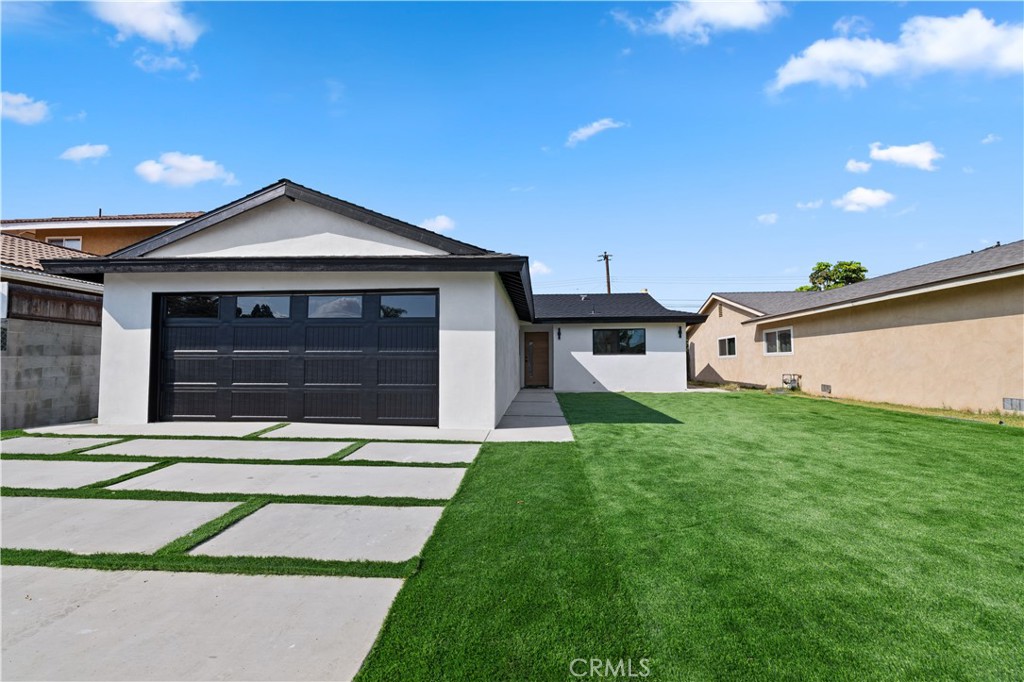 Modern Masterpiece in the Heart of Carson, CA!
Step into this stunning, fully renovated 4-bedroom, 2-bathroom home located in one of Carson’s most desirable neighborhoods. With 1,225 sq ft of beautifully crafted living space, this property offers a perfect blend of modern elegance, high-end finishes, and top-tier upgrades.
Key Features:
Fully updated plumbing and electrical systems
Brand new HVAC for year-round comfort
New dual-pane windows for energy efficiency and natural light
Sleek LVP flooring throughout, adding a clean and modern touch
Designer kitchen featuring -style cabinets, a striking waterfall island with built-in stove and range hood, LED accent lighting, and electrical outlets—ideal for entertaining
Custom entertainment wall with LED-lit floating shelves and a smooth stucco finish, offering a luxurious focal point for your living room
Elegant master bathroom with dual vanity, LED-lit mirror, and tasteful modern finishes
Smooth stucco exterior finish giving the home a clean, sophisticated curb appeal
New pavers on the driveway and leading to the front entrance
Freshly poured concrete patio in the backyard, perfect for outdoor gatherings
Every inch of this home has been thoughtfully designed with quality and style in mind. From the gorgeous curb appeal to the custom interior touches, this home is truly one of the best-looking properties in all of Carson.
Ideally located near top-rated schools, parks, shopping, and major freeways—this home checks all the boxes for modern California living.