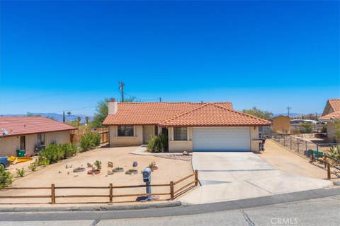 Photo of 5775 Hall Ln LN, 29 Palms, CA 92277 (MLS # JT26169013)