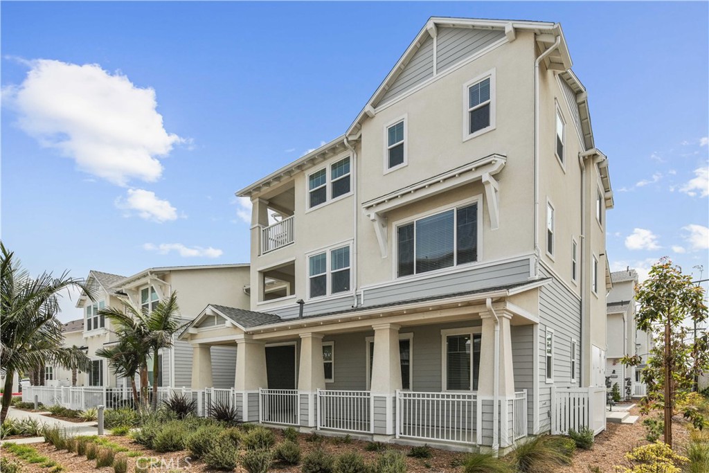 Modern Coastal Luxury Townhome Rare Multi-generational floor plan by the Ocean-NEW CONSTRUCTION-Move-in ready – last homes available! Experience the ultimate in modern coastal living in this stunning end-unit luxury townhome surrounded by lush landscaping, just moments from the ocean. This thoughtfully designed residence combines elegant finishes, open spaces, and flexible living for a multi-generational lifestyle.
Main Level:
Enter through a beautifully landscaped, large fenced front patio that welcomes you into a spacious multi-generational suite complete with a kitchenette area featuring a sink, microwave, mini fridge area, and shaker-style upper and lower cabinets. The ensuite bathroom features a vanity area and a walk-in shower with oversized white tile to the ceiling, creating a serene, spa-inspired coastal vibe. Additional highlights include a storage nook leading into ensuite and a stackable washer and dryer laundry closet in the hallway leading to the multi-generational suite, with easy garage access for convenience.
Second Level:
The open-concept gourmet kitchen is a chef’s dream, featuring Wolf appliances, a large island with bar seating, shaker cabinets, a walk-in pantry, and an open butler’s area with additional prep space and built-in microwave in the lower cabinets. Separate dining area with a private patio, perfect for extended dining, relaxation or entertaining. This level also includes a bathroom with vanity and a private bedroom with a walk-in closet, ideal for guests or a home office.
Third Level:
Upstairs, enjoy a convenient side-by-side laundry closet in the hallway. A secondary bedroom offers a walk-in closet and ensuite bathroom with a tub-shower combo accented by full-height oversized white tile and a shaker vanity with dual sink that continues the home’s coastal aesthetic.
The gorgeous primary suite is a true retreat, featuring two walk-in closets, a private balcony, and a spa-like ensuite with a freestanding soaking tub and a walk-in shower surrounded by oversized white tile to the ceiling.
Throughout the home, large windows fill every room with natural light and provide charming neighborhood views, while the lush landscaping enhances the home’s private, coastal-style.
Don’t miss this opportunity—this move-in ready, beautifully staged home is prepared for buyers today. Last homes available—schedule your private showing before it’s gone!