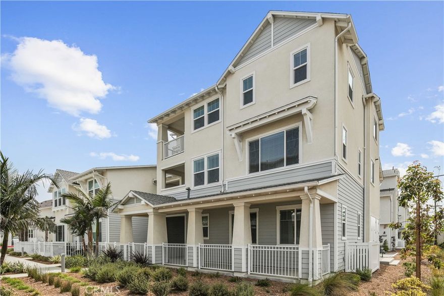 Modern Coastal Luxury Townhome Rare Multi-generational floor plan by the Ocean-NEW CONSTRUCTION-Move-in ready – last homes available! Experience the ultimate in modern coastal living in this stunning end-unit luxury townhome surrounded by lush landscaping, just moments from the ocean. This thoughtfully designed residence combines elegant finishes, open spaces, and flexible living for a multi-generational lifestyle.

Main Level:

Enter through a beautifully landscaped, large fenced front patio that welcomes you into a spacious multi-generational suite complete with a kitchenette area featuring a sink, microwave, mini fridge area, and shaker-style upper and lower cabinets. The ensuite bathroom features a vanity area and a walk-in shower with oversized white tile to the ceiling, creating a serene, spa-inspired coastal vibe. Additional highlights include a storage nook leading into ensuite and a stackable washer and dryer laundry closet in the hallway leading to the multi-generational suite, with easy garage access for convenience.

Second Level:

The open-concept gourmet kitchen is a chef’s dream, featuring Wolf appliances, a large island with bar seating, shaker cabinets, a walk-in pantry, and an open butler’s area with additional prep space and built-in microwave in the lower cabinets. Separate dining area with a private patio, perfect for extended dining, relaxation or entertaining. This level also includes a bathroom with vanity and a private bedroom with a walk-in closet, ideal for guests or a home office.

Third Level:

Upstairs, enjoy a convenient side-by-side laundry closet in the hallway. A secondary bedroom offers a walk-in closet and ensuite bathroom with a tub-shower combo accented by full-height oversized white tile and a shaker vanity with dual sink that continues the home’s coastal aesthetic.

The gorgeous primary suite is a true retreat, featuring two walk-in closets, a private balcony, and a spa-like ensuite with a freestanding soaking tub and a walk-in shower surrounded by oversized white tile to the ceiling.

Throughout the home, large windows fill every room with natural light and provide charming neighborhood views, while the lush landscaping enhances the home’s private, coastal-style.

Don’t miss this opportunity—this move-in ready, beautifully staged home is prepared for buyers today. Last homes available—schedule your private showing before it’s gone!