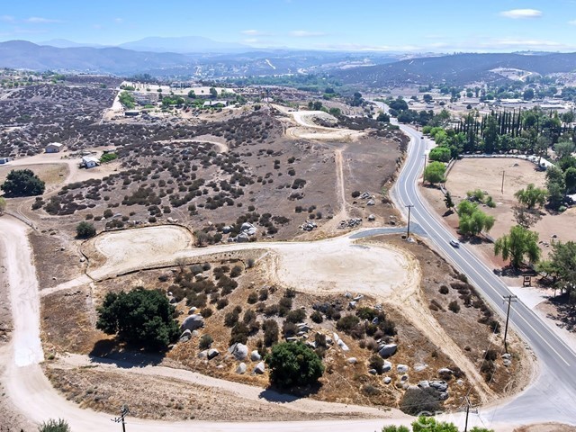 4.48 Acres – Build-Ready in Temecula Wine Country
Experience the charm of wine country living with this 4.48-acre finished parcel, perfectly positioned near Temecula’s renowned wineries, shopping, and dining. All the groundwork is done—multiple graded pads, completed perc test, and soils engineer reports—making it truly ready to build. Ride horseback for miles right from your property or design your dream estate with the included house plans. Ideal for a custom home, multi-generational compound, or equestrian property. A neighboring finished lot is also available for expanded acreage. Owner will carry financing.