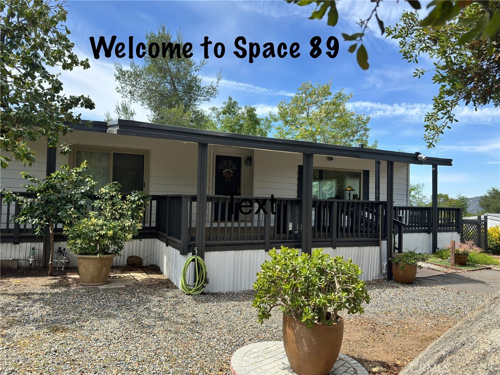 JUST LOWERED PRICE for this 1770 SQ FT HOME ON VERY LARGE CORNER LOT with NO NEIGHBORS BEHIND, & NOONE ON ONE SIDE as it borders the PRACTICE PUTTING GREEN: BOTH AREAS THE PARK MAINTAINS. AT SPACE 89, you DO NOT PAY HOA'S OR PROPERTY TAXES. LOCATED in the 55+ SENIOR PARK OF SKYLINE RANCH homes here are on a LAND LEASE. A LANDLEASE is where you OWN THE HOME and pay rent on your SPACE. CURRENT SPACE RENT IS $1600 a month. (PLEASE CHECK W/PARK OFFICE to CONFIRM AMOUNT.) THE AMENITIES of the PARK ARE FREE GOLF on a REGULATION 9-HOLE GOLF COURSE; PRACTICE PUTTING GREEN; OUTDOOR Practice GOLF DRIVING ENCLOSURE; TWO SWIMMING POOLS (Salt Water); A SPA; TWO HORSESHOE PITS; A Covered PICNIC AREA W/TABLES on a LARGE EXPANSE OF LAWN; & a SEPARATE FREE-STANDING BUILDING just for EXERCISE. And what about the Home. The home has PERMITTED 2 ROOM ADDITIONS. One room has a FULL SIZE DRYWALLED ADDITION W/FIREPLACE; a CUSTOM FRONT DOOR and the 2ND ROOM ADDITION can be used an OFFICE, CRAFT ROOM or Buyers Choice as well as an EXIT DOOR TO BACK YARD & FULLY FENCED DOG RUN. Both BATHROOMS & KITCHEN HAVE BEEN UPGRADED. With LOTS of CABINETS, the KITCHEN has NEW Quartz COUNTERS, SLIDE OUT PANTRY SHELVING & is OPEN to a room that can serve either as FAMILY ROOM or DINING AREA. ALL APPLIANCES CONVEY. These include a NEW WASHER/DRYER; NEWER REFRIGERATOR, OVEN, RANGE TOP & FREE-STANDING FREEZER. Updated DOUBLE-PANED WINDOWS and NEW FLOORING have been installed in the home. BOTH BATHROOMS have been UPGRADED, The Master Bathroom has CUSTOM STONE TILING w/a Deep SOAKING TUB w/SHOWER. There are TWO NEW VANITIES, each with their OWN SINK. OUTSIDE, the home has recently been completely PAINTED. There's a WRAP AROUND PORCH & one has VIEWS of MOUNTAINS, GREENERY & LAND that can’t be beat. PARKING IS AN ADDED BONUS. No Tandem Parking. There’s a CIRCULAR DRIVEWAY. Not to leave out a FAVORITE AMENITIY is the COVERED BACKYARD BAR-B-QUE AREA. Built on a Concrete Slab the BAR-B-QUE AREA. has a LONG STONE BUILT-IN BAR AREA w/ BUILT-IN STAINLESS-STEEL GRILL & REFRIGERATOR. BUILT IN 1972 this home SHOWS LIKE A MUCH NEWER HOME due to ALL OF THE UPGRADES. SKYLINE RANCH is set atop PARADISE MOUNTAIN and is a Gated Community. The PRIVATE SETTING of this home is ONE TO SEE. Set on a LOVELY LARGE LOT, in a LOVELY PARK, this home is where one can SIT, RELAX & ENJOY the VIEWS on a typical peaceful day in SKYLINE RANCH COUNTRY CLUB. Why not COME & SEE FOR YOURSELF.