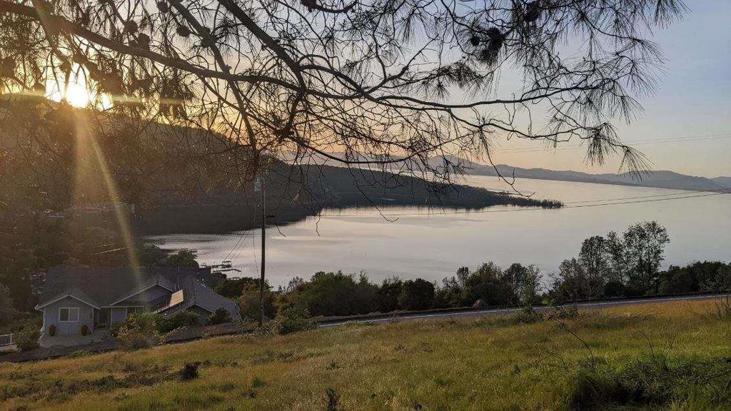 This property features some of the most breathtaking, unobstructed lake and mountain views you'll find in Lake County! This large lot spans about a quarter acre. It has been cleared in preparation for building your dream home! It is located in the desired Riviera Heights Subdivision. This community has a pool and clubhouse that overlooks the lake perfect for parties and events. There is also a Marina that offers boat launching, dock, pier, fishing, picnic areas, and swimming. The HOA covers all utilities and maintenance of the amenities in the area. This land includes your own water meter and is ready to build on!