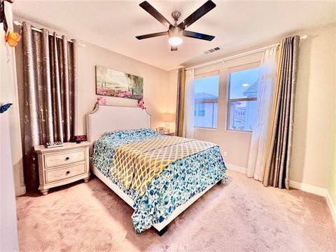 Photo of 71 Cartwheel, Irvine, CA 92618 (MLS # OC25129537)