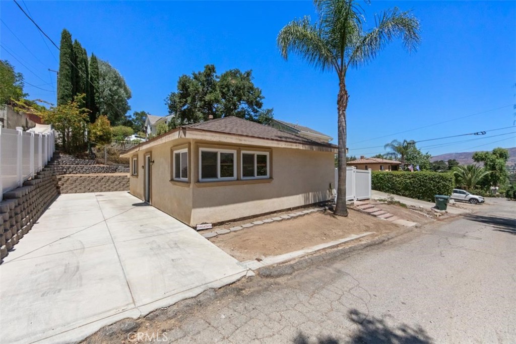 This beautifully renovated single story home with NO HOA is nestled in the sought after Santa Susana Knolls and is sure to please and ready for you to call it home. This charming house has upgrades throughout including.... brand new flooring, a fully upgraded bathroom, freshly painted kitchen cabinets, a spacious closet added to the Primary Bedroom, all new ceiling fans in the bedrooms, new front door and blinds for all the windows and a newly added closet for extra storage. The entire interior has been freshly painted, giving it a bright, clean feel that you’ll love walking into every day. The exterior features an expansive backyard with all new vinyl fencing throughout for plenty of privacy. Tucked in a quiet neighborhood with great curb appeal and close to all banking, restaurants, award winning schools, parks and close to freeway access and just minutes away from the valley. This is your perfect starter home or investment opportunity! Don’t miss your chance to make this cozy gem yours! This one will go fast!