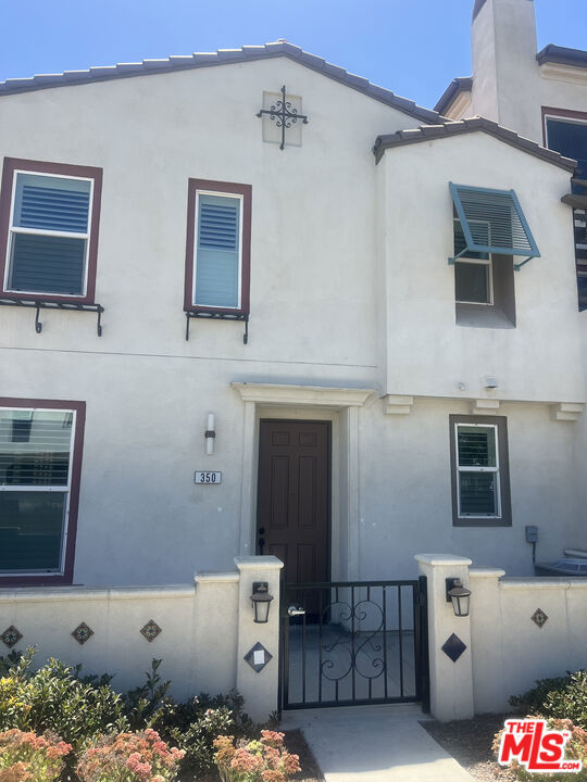 Beautiful - remodeled END unit townhome. Features 3 large bedrooms. The Primary Suite has a large walk in closet with custom shelving and dresser drawers along with an attached bathroom. Additional Bathroom upstairs with a powder room downstairs. The home has it's own laundry room upstairs (washer and dryer included with the sale - no warranties) Beautiful Shutters throughout, luxury vinyl flooring, stainless steel kitchen appliances, cute patio area to have a BBQ, new brick wall decor, and is conveniently located across from the swimming pool area. There is also a Private, 2 Car Attached Garage making this an exceptional home to live in. Move In Ready.