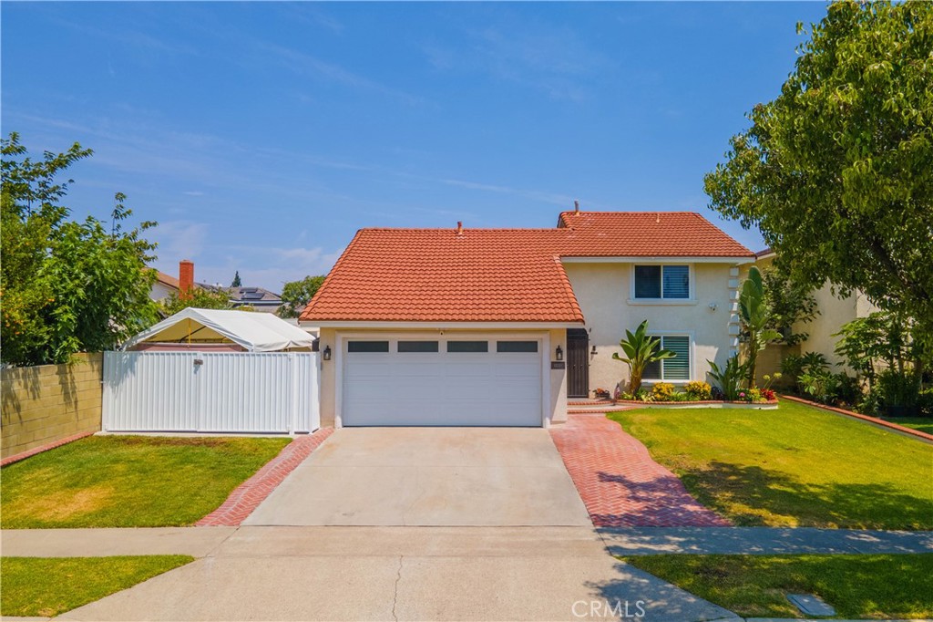 Welcome to 13311 Rose Street, where modern upgrades meet Cerritos charm. Step inside to vaulted ceilings and an open-concept layout that connects the living room, dining room, and 2021-remodeled kitchen. The chef’s kitchen showcases quartz countertops, marble backsplash, farmhouse sink, oversized pantry, Thermador stove, double dishwasher, stainless appliances, and white shaker cabinets. Luxury vinyl floors lead you through bright spaces, with a fireplace and sliders in both living and dining rooms opening to covered alumawood patios. The downstairs offers two bedrooms (one with patio and hot tub access) and a sleek bath with stand-up shower. Upstairs, the primary suite features a versatile office/workout/nursery space which is convertible to a 4th bedroom.
Outdoors, enjoy two covered patios, gazebo, new built-in BBQ, wine fridge, outdoor TV and speakers. RV parking, a workshop and 220V garage power add exceptional functionality.
Smart home upgrades, central air & heat with new ducting, tankless water heater, and fans in every room complete this move-in ready home. Cerritos offers award-winning schools, parks, and is walking distance to the class Cerritos Library and Performing Arts Center and unbeatable freeway access. Schedule your showing while it is available!