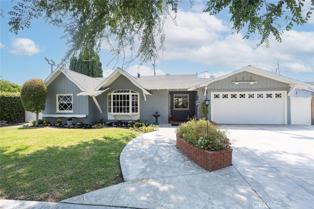 Welcome to this Beautiful Anaheim Gem Located on a quiet cul-de-sac. When you enter this adorable home, it will greet you with a lovely living room, 4 Large Bedrooms and 3 full Bathrooms. Great for entertaining as you have a Large Family Room with a cozy fireplace and high beam wood ceilings that lead out to a wonderful, landscaped backyard. Stunning hardwood flooring in the living room, Halls, kitchen and Family room. Newer Central heating and A/C. Lovely and Bright Kitchen looking out to the backyard and family room. Storybook Curb appeal, this home is close to Disneyland, so you will enjoy nightly Fireworks from your own backyard. Exterior of home was recently painted. Walking Distance to Loara High School. Close to dining, entertainment and Freeways.