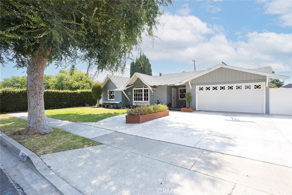 Welcome to this Beautiful Anaheim Gem Located on a quiet cul-de-sac. When you enter this adorable home, it will greet you with a lovely living room, 4 Large Bedrooms and 3 full Bathrooms. Great for entertaining as you have a Large Family Room with a cozy fireplace and high beam wood ceilings that lead out to a wonderful, landscaped backyard. Stunning hardwood flooring in the living room, Halls, kitchen and Family room. Newer Central heating and A/C. Lovely and Bright Kitchen looking out to the backyard and family room. Storybook Curb appeal, this home is close to Disneyland, so you will enjoy nightly Fireworks from your own backyard. Exterior of home was recently painted. Walking Distance to Loara High School. Close to dining, entertainment and Freeways.