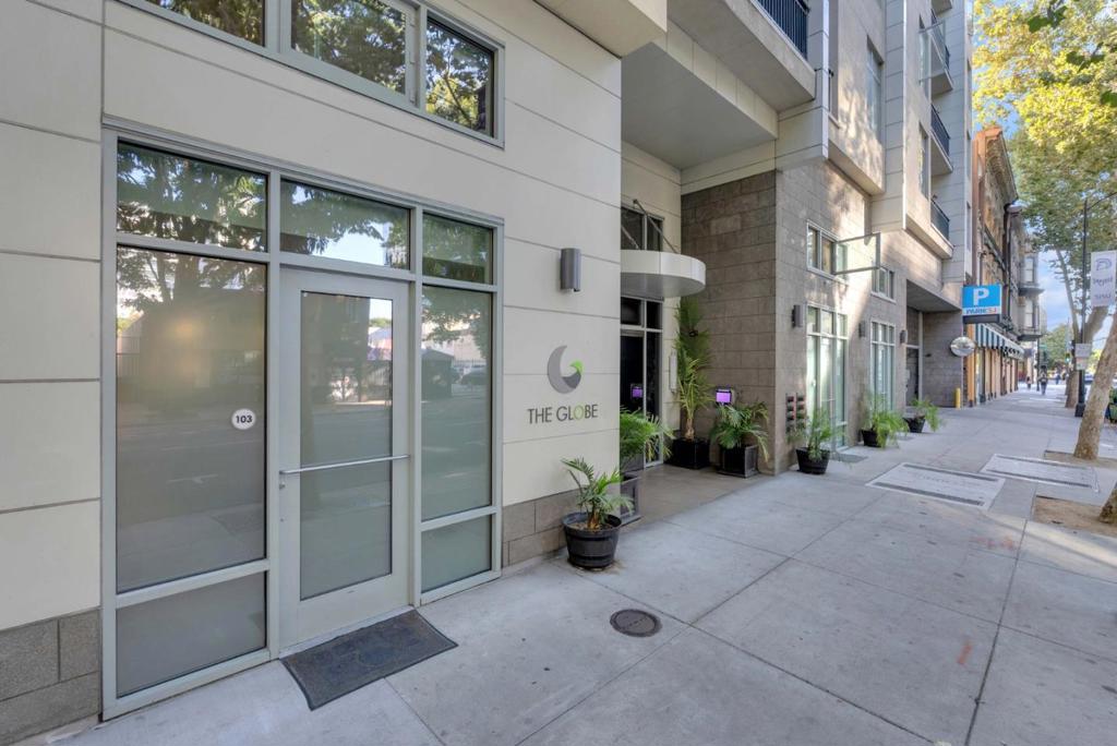 Welcome to The Globe on 3rd Street, where urban convenience meets modern loft living. Enjoy your own private entrance and gated one-car parking, with additional metered parking right outside for guests and visitors. Step outside and youre just moments away from local favorites like Mountain Mikes Pizza, San Jose State University, San Pedro Square, City Hall, and major downtown employers such as Zoom, Adobe, and various financial firms. Inside, this stylish one-bedroom loft features upgraded laminate flooring and fresh paint. The main level offers an open-concept living area, dining space, and kitchen, along with a full bathroom equipped with a shower-over-tub combo and a stackable washer and dryer. Upstairs, the loft bedroom is filled with natural light from additional windows and includes a walk-in closet and a convenient second sink. Residents also enjoy access to the on-site gym located on the second floor, a welcoming lobby area with mailboxes, and a beautifully landscaped courtyard.