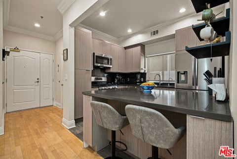Tiny photo for 11840 Dorothy Street #302, Los Angeles, CA 90049 (MLS # 26999817)