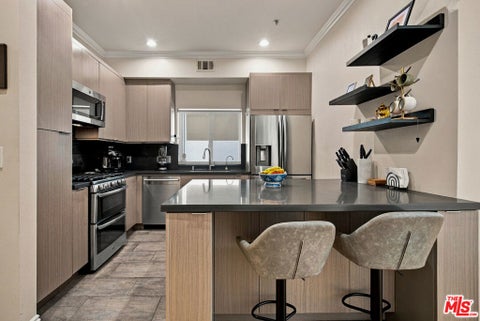 Tiny photo for 11840 Dorothy Street #302, Los Angeles, CA 90049 (MLS # 26999817)