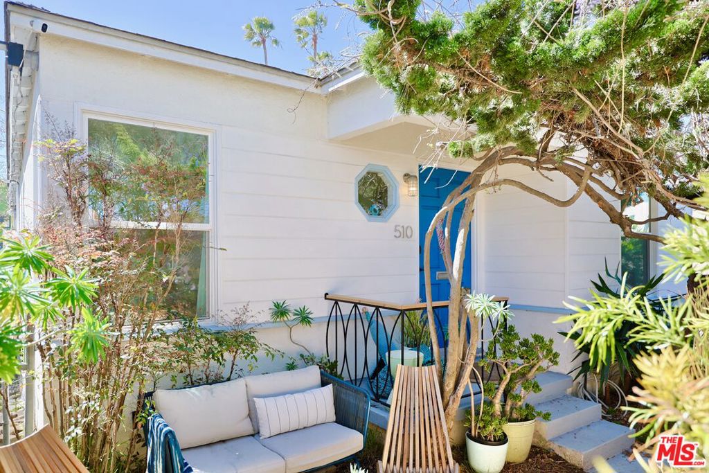 Welcome to 510 Venice Way, where architectural design meets laid-back coastal living in the heart of Venice.Tucked between the Pacific Ocean, the historic canals, and Abbot Kinney's vibrant energy, this beautifully reimagined bungalow captures the essence of Venice's creative soul.This architect-renovated home blends original character with thoughtful, design-forward upgrades. Inside, you'll find hardwood floors, Italian tile, custom quartz countertops, and spa-style bathrooms with a Hansgrohe rain shower, deep soaking tub, and Toto bidet.Smart home features include new low-e windows, Lutron dimmers and locks, and a reimagined garage/flex space with a motorized glass-panel door, EV charger, and stacked laundry. Outdoors, the lush private garden with teak fencing, native landscaping, and built-in seating offers a tranquil space for relaxing or entertaining.Located just two blocks from the beach and Abbot Kinney, and across from the Venice Farmers Market this is true Venice living, with comfort, soul, and style.