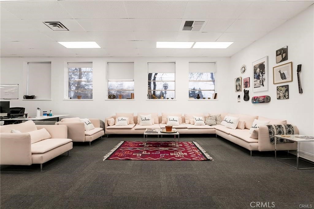 This 8,517 sq. ft. office space offers a highly functional layout ideal for a variety of business operations, including call centers, tech firms, or light industrial offices. The building features private entrances, a large bullpen area, several small offices, a dedicated server room, multiple break rooms, and restrooms. The space includes 95 workstations, each equipped with power and wired for high-speed internet, making it truly plug-and-play. Recently remodeled and freshly painted by the previous tenant, the interior is modern, clean, and move-in ready. Ample on-site parking provides convenience for staff and visitors. Zoned for manufacturing and warehouse use, this versatile property supports a range of commercial activities and is available for immediate lease.