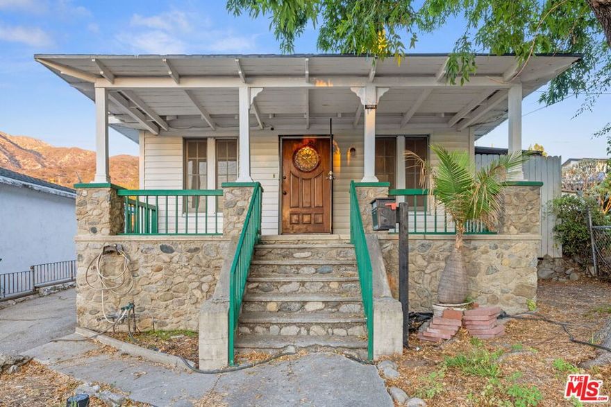 Welcome to 10606 Commerce Avenue, a classic 2-bedroom, 1-bath Craftsman-style cottage full of warmth and opportunity. The inviting stone-clad front porch with tapered columns, green-trimmed railings, and a beautiful stained-glass front door set the tone for this special home. Step inside to discover freshly painted interiors, rich wood floors, and a welcoming living room centered around a cozy fireplace.The property's generous backyard offers mature fruit trees including citrus and avocado. This home is a great starter opportunity, ready for a new owner to bring their vision and add sweat equity while preserving its original charm.Offered as a probate sale with full authority, this is a straightforward purchase with fantastic potential for buyers looking to create their own personal haven in Tujunga.