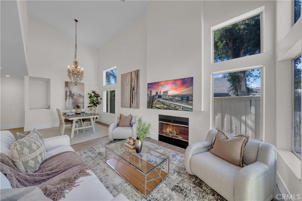 Welcome to 19055 Woodland Way! This beautifully remodeled home in desirable Portola Hills features a spacious open floor plan with vaulted ceilings, abundant natural light, and a modern kitchen with stainless steel appliances and a large island. The primary suite offers a dual vanity and ample closet space. Enjoy the private backyard with a covered patio and lawn—perfect for entertaining. Community amenities include a pool, spa, clubhouse, fitness center, tennis courts, and more. Conveniently located near parks, trails, shopping, and freeways. Don’t miss this gem!