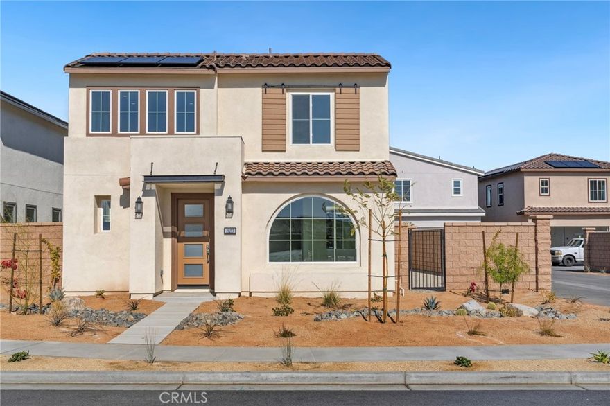 Welcome to Alara at University Park, a newly developed community in Palm Desert, ideally situated near top-tier restaurants and shopping destinations. Available for lease, a newly constructed home located close to the state-of-the-art community center. The spacious Lumiere floor plan offers 5 bedrooms, 4.5 bathrooms, 2,537 sq.ft. of living space, and 3,938 lot sq.ft. along with a 2-car garage. As you enter, you'll be immediately struck by the impressive two-story foyer and expansive living area. The kitchen is designed for both style and functionality, featuring a central island, walk-in pantry, and high end stainless-steel appliances. A private multi-gen suite is located on the first floor, complete with its own bathroom and walk-in closet. Upstairs, the primary bedroom provides a retreat with an upgraded ensuite bath, dual vanities, and a large walk-in closet. The second floor also includes a loft, additional bedrooms, and a private bath in bedroom 4. This home is enhanced with numerous upgraded finishes throughout. The side courtyard offers a fantastic space for outdoor entertaining, with easy access from the dining room via upgraded stacking sliding doors. Residents will also enjoy the community’s impressive amenities, including a modern community center, pools, spa, fitness center, and pickleball and bocce ball courts. This home is equipped with an owned solar panel system, providing tenants with the benefit of lower energy bills and greater savings.