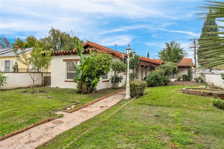 Welcome to 815 West Yosemite Avenue in Madera a stunning Spanish-style adobe brick home full of character and timeless charm!

Step through the beautifully landscaped courtyard and into the classic Spanish-style front porch, setting the tone for this rare Madera gem. Inside, a formal entry welcomes you to a home rich with original architectural details that reflect authentic Spanish hacienda design, rarely found in today's market.

This unique residence offers 2 bedrooms, 1.5 bathrooms, plus a versatile bonus roomperfect for a home office or additional bedroom. The property also features a detached garage with alley access, providing convenient parking and extra storage.

Enjoy the blend of historic elegance and modern comfort in one of Madera's most desirable central locations.

This Spanish-style home is truly one of a kindschedule your private tour today!