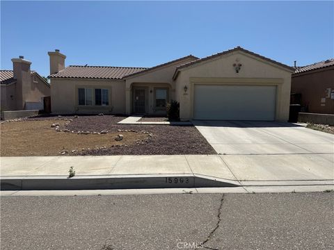 Photo of 15993 CARMELIA Drive, Apple Valley, CA 92394 (MLS # CV26135101)