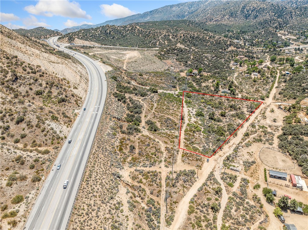 “This beautiful 2.59-acre lot is perfectly situated just at the base of where the desert meets the mountains. Conveniently, it already has water and electric utility on site. This property is Ideally located for commuters and truly offers the best of both worlds. Buyer & Buyers agent responsible to check with County for building requirements.