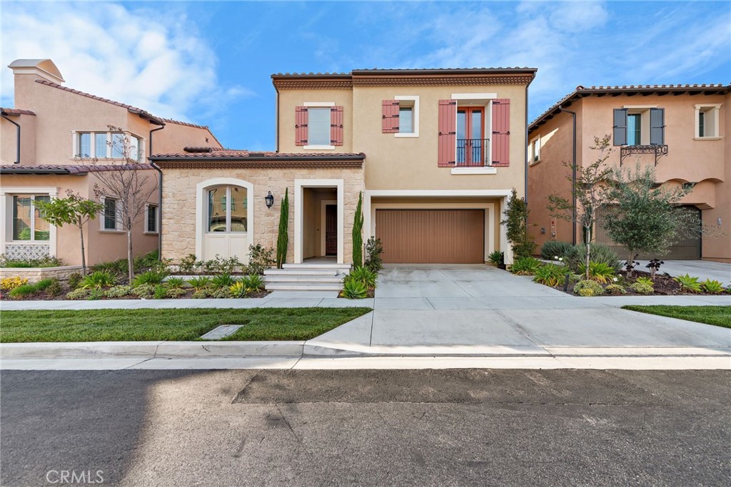 Located in the prestigious gated community of The Groves at Orchard Hills, this beautifully crafted Palermo Plan 2 residence by Taylor Morrison offers an exceptional blend of luxury, comfort, and modern elegance. Featuring 4 bedrooms, 4.5 bathrooms, and a two-car garage, this home showcases impeccable design and thoughtful functionality.
Upon entering, you are greeted by luxury waterproof vinyl plank flooring throughout the open-concept layout. Dramatic high ceilings and expansive windows fill the home with abundant natural light, creating a warm and inviting atmosphere.
The main floor includes a spacious guest suite with a private bathroom, along with a versatile office space that can easily be converted into a fifth bedroom to suit your needs.
The open-concept great room seamlessly connects to the gourmet kitchen and dining area, forming the heart of the home. The kitchen is a chef’s dream, appointed with elegant quartz countertops, an oversized island with an extended bar seating, high-end stainless steel appliances, and custom white cabinetry—perfect for both daily living and entertaining.
Upstairs, the loft area offers a cozy retreat for family movie nights or casual gatherings, enhanced by built-in lighting and wide windows.
The luxurious primary suite is a true private sanctuary, featuring dual vanities, a large walk-in shower, a soaking tub, and a spacious walk-in closet with custom built-ins. Two additional ensuite bedrooms are thoughtfully positioned on the opposite side of the loft, providing privacy and quiet for all family members.
This home also comes equipped with a fully owned solar system, promoting energy efficiency and long-term savings while supporting a sustainable lifestyle.
Step outside to the beautifully designed California Room, offering a covered outdoor living space perfect for relaxing or entertaining. Surrounded by picturesque hillsides and lush avocado groves, the backyard creates a peaceful, scenic retreat.
Residents of Orchard Hills enjoy access to an array of resort-style amenities, including multiple pools, clubhouses, parks, hiking trails, basketball courts, and tennis courts.
The community is also conveniently close to award-winning schools and the vibrant Orchard Hills Shopping Center, providing both daily convenience and luxury living.
Don’t miss this rare opportunity to experience the best of Irvine’s most sought-after community, where everyday living feels like a vacation!