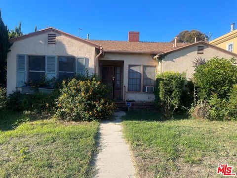 Photo of 5735 Bowesfield Street, Los Angeles, CA 90016 (MLS # 24475001)