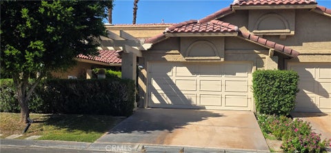 Photo of 77796 Woodhaven DR N, Palm Desert, CA 92211 (MLS # JT26206830)