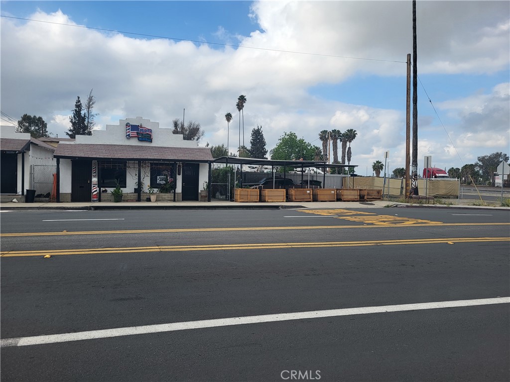 Welcome to High Grove !! Two Parcels Are Being Sold As One Unit. Current Space is being used as a Barber Shop and the Adjacent Vacant Corner Lot is being used as the Parking Lot. The Parcel with the Building also has a Garage/Storage Building Approximately 1,000 sq foot. It also has an Attic. Further, the Garage/Storage building can accommodate Two Vehicles. In the last couple of years - the Meter to the parcel with the structure was updated. Total Square Footage when combining both Parcels is Approximately 5, 662.