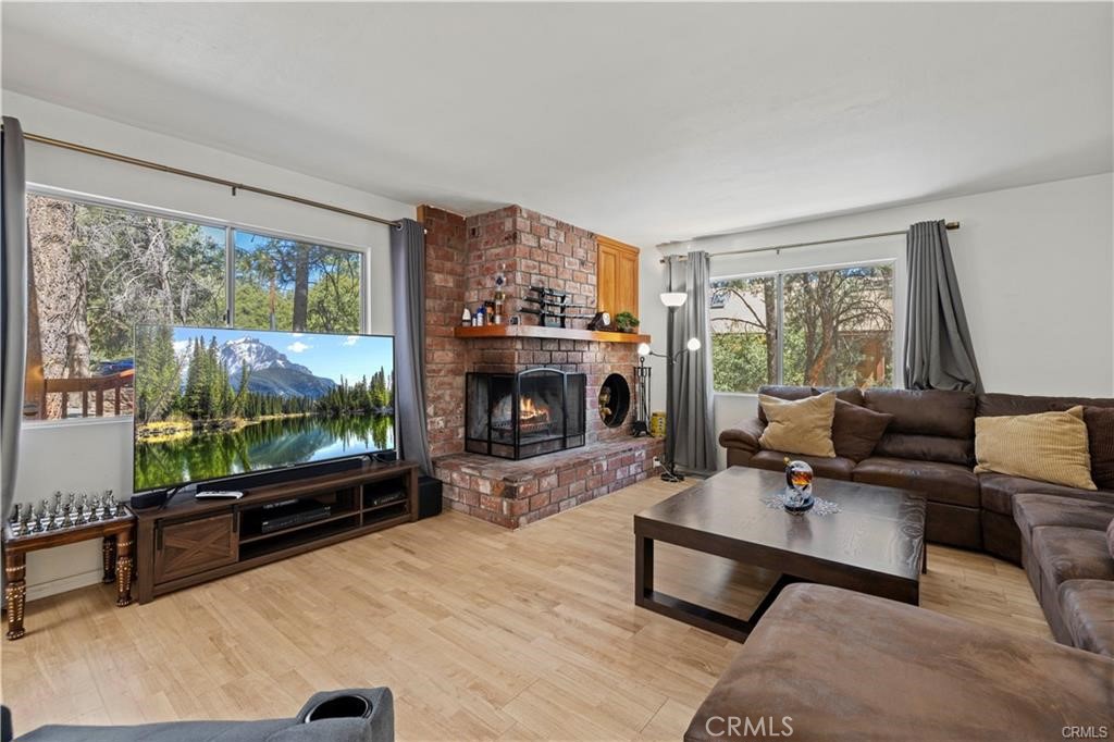 Gorgeous house in Pine Mountain Club. Just an hour from Santa Clarita and Bakersfield. As you step inside, you will be greeted by the warm embrace of wood flooring and a light, airy open floor plan that provides ample space for all your needs. Featuring spacious bedrooms, including one on the main level, this home boasts a generous lot where you can relish in peaceful meadow and forest views, surrounded by majestic pines and beautifully landscaped yards. Whether you are looking to host grand gatherings or simply unwind in a serene setting, the expansive deck is the perfect place to create lasting memories. Additionally, the home offers practical amenities such as a storage area with a concrete floor, an RV driveway, and an oversized two-car garage with custom cabinets and workspace. Currently used as a game room. This outstanding property is a rare find in Pine Mountain Club.
