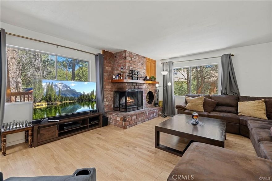 Gorgeous house in Pine Mountain Club.  Just an hour from Santa Clarita and Bakersfield.  As you step inside, you will be greeted by the warm embrace of wood flooring and a light, airy open floor plan that provides ample space for all your needs. Featuring spacious bedrooms, including one on the main level, this home boasts a generous lot  where you can relish in peaceful meadow and forest views, surrounded by majestic pines and beautifully landscaped yards. Whether you are looking to host grand gatherings or simply unwind in a serene setting, the expansive deck is the perfect place to create lasting memories. Additionally, the home offers practical amenities such as a storage area with a concrete floor, an RV driveway, and an oversized two-car garage with custom cabinets and workspace.  Currently used as a game room.   This outstanding property is a rare find in Pine Mountain Club.