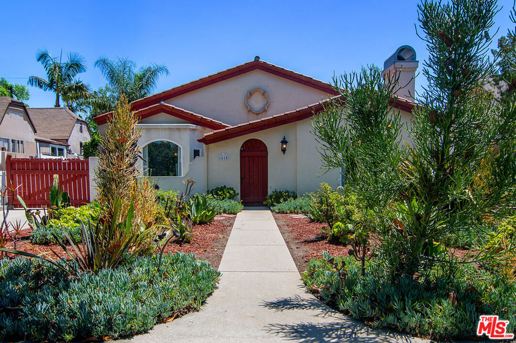 Charming 2004 single-story Spanish-style home in the heart of Crestview, offering 3 bedrooms, a family room, and a dedicated office. Enter through a private, atmospheric courtyard into a formal foyer, leading to a street-facing living room with a fireplace and an expansive dining room ideal for entertaining. The dining room flows into an eat-in kitchen featuring a peninsula and designated breakfast area. A central hallway includes a convenient powder room and opens to a spacious family room with backyard access, perfect for indoor-outdoor living. Adjacent to the family room, a functional office provides a quiet workspace. The southern wing houses two secondary bedrooms with a shared Jack-and-Jill bathroom, followed by a primary suite with dual closets, an en-suite bathroom featuring double vanities, a separate shower, tub, and private water closet. The primary suite opens to a well-maintained backyard and a versatile garage flex space, ideal for storage or a home gym. This home seamlessly blends classic Spanish charm with modern functionality.