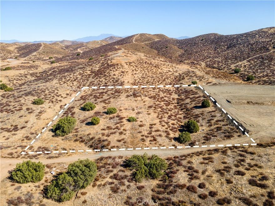 This lot is Located in the beautiful Lake Elsinore Hills, just 3 miles from the North Gate of Canyon Lake. Look at this incredible opportunity to build your dream home in a prime location. Make it yours and enjoy the serene surroundings and growth potential in this area! This 2.5-acre lot offers a fantastic opportunity for residential development in an area experiencing significant growth. While currently undeveloped, neighboring properties are being graded, and utilities are readily available nearby. With some grading and site preparation, this lot has great potential for a custom home or even a second home as an ADU (Accessory Dwelling Unit). Strategically located between the 15 and 215 freeways, this property provides easy access to both major freeways, from Highway 74, making commuting a breeze. The area is well-connected to nearby amenities, including local schools, shopping centers like Costco, Home Depot, Target, and Walmart, and even a new Stater Bros. grocery store under construction. You’ll also find a variety of dining options, from local restaurants to fast food, all within a short drive. If you’re looking to explore, you’re just minutes away from Canyon Lake, and a quick drive either direction will take you into Lake Elsinore or Perris, both offering even more shopping, dining, and recreational opportunities. Plus, the property is close to downtown Lake Elsinore’s Main Street, which is home to many more shops, eateries, and local attractions. This rapidly evolving area makes this property a prime investment for anyone looking to build in a growing neighborhood with convenient access to everything you need. It’s time to explore this incredible opportunity, don’t let it pass you by!
