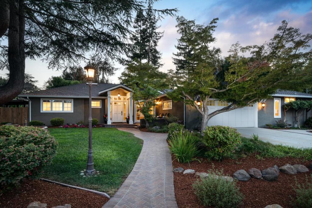 This exquisite single-level home is beautifully situated in the sought-after Grant Park neighborhood. Expertly designed, it features distinctive artistic touches throughout from the high ceilings, designer baths, multi-layered crown molding, and custom entertaining unit, to the decorative bed frame accent in the primary suite. Seven skylights and multiple French doors fill the interior with natural light highlighting the refinished floors and fresh paint throughout the interior. The rear yard is a private oasis with multiple entertaining venues, pool, spa, waterfall, game table and flourishing yard. Side yard has space for RV storage or as an additional play area. These features are complimented by a custom built-in bar w/sink and refrigerator, custom built-in BBQ area w sink and lighted dining area for year-round enjoyment. Ideally located with convenient access to both hwys 85 and 280, this home offers an effortless commute to major Silicon Valley companies. Blocks from Grant Park Community Center w/classes, sports field, and summer concerts, Woodland Library, and Foothill Crossing Shopping Center. Experience the warmth and exceptional community that make this home and neighborhood truly special.