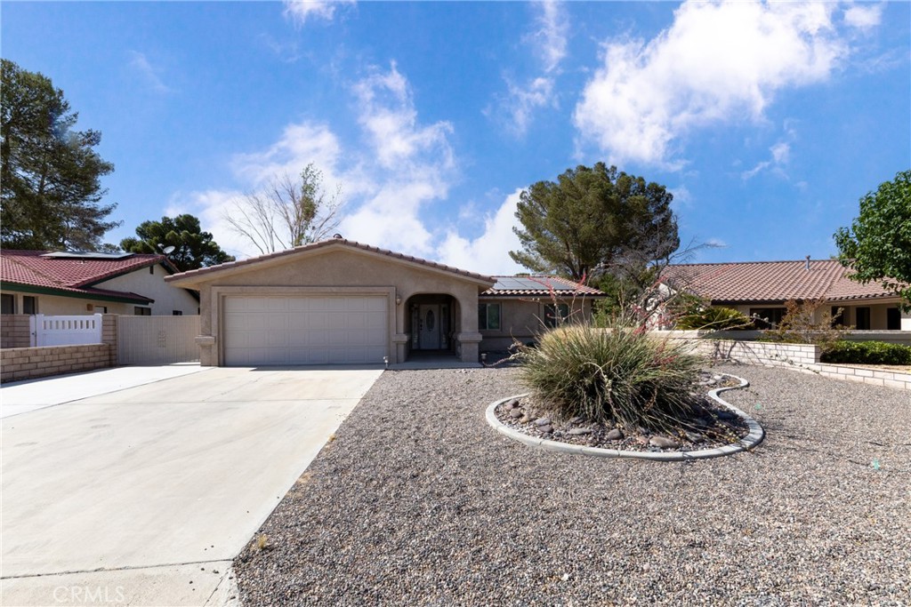 Beautiful Golf Course HOME on one of the most desirable area in Silver Lakes Community! This little gem has multiple upgrades including granite in kitchen and baths, tile flooring, new heating and air conditioning system, & energy saving solar panels. OPEN kitchen, living, & dining areas. Beautiful brick fireplace enhances your dining experience. Master bedroom is large with walk-in closet and views of the golf course. Easy maintenance front and sides with large gate and cart drive on one side. Two car-garage with golf cart door. Double patios in back and a roomy low maintenance backyard with endless views of green grass and trees! Located on #1 East fairway. Located between Victorville and Barstow. Your monthly HOA dues include use of all of the amenities including 27 hole golf course, tennis courts, 24hr gym, equestrian facilities so you can stable your horses, two beautiful lakes for fishing, boating, kayaking, paddle boarding, and even windsurfing. Hiking and mountain bike trails, and even RV parking.
