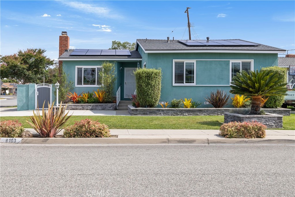 Welcome to this beautifully upgraded 3-bedroom home, ideally located on a corner lot at the entrance of a cul-de-sac street in Lakewood. The open-concept layout seamlessly connects the kitchen, living room, and family room-creating a warm and inviting space perfect for both everyday living and entertaining. The remodeled kitchen is a true centerpiece, featuring elegant Granite countertops, wine fridge, ample cabinetry, and a layout that opens directly to the main living areas. Both bathrooms have been tastefully remodeled with modern finishes, including a walk-in shower and matching Corian counters. Each of the three bedrooms provides generous closet space, with the primary suite boasting a walk-in closet for added convenience. The family room is filled with natural light and includes enclosed cabinetry for stackable laundry, with direct access to a private covered patio and backyard—ideal for relaxing or hosting guests. Recent upgrades include a newer roof and AC system, electrical panel, windows, interior doors, interior and exterior paint, Honeycomb window coverings and 4-year-old solar panels. With its prime location, thoughtful improvements, and welcoming layout, this Lakewood gem is ready to be your next home.