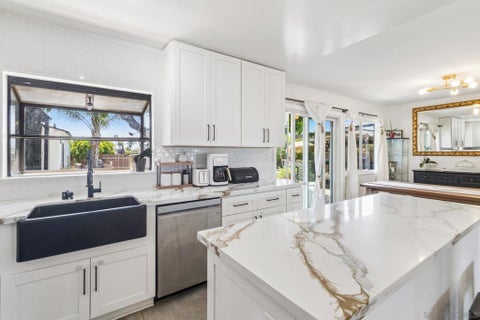 Photo of 9239 Bellagio Rd Rd, Santee, CA 92071 (MLS # 260019684SD)
