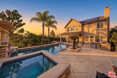 Photo of 20601 Lugano Way, Porter Ranch, CA 91326 (MLS # 26104591)