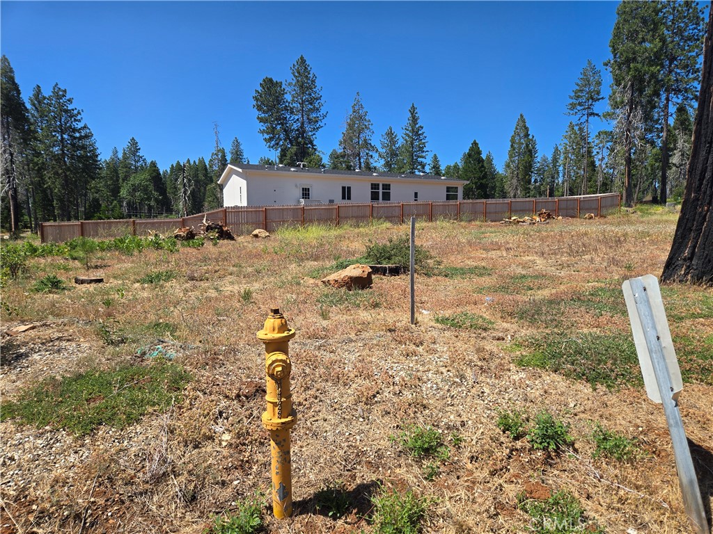 AMAZING property in an AMAZING location! Per seller, the septic was inspected around 2020 and PASSED INSPECTION! Previous home was 1800+ feet with a 3 car garage! Pictures attached to show you what this property looked like prior to the Camp Fire. Water is through Del Oro, and electricity is at the street! Driveway is even intact! Check out this beauty today!