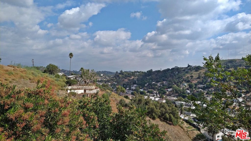 Exceptional opportunity to develop a custom home in the heart of El Sereno, one of Los Angeles' most up-and-coming neighborhoods. This residential view lot offers sweeping vistas of surrounding hills and the charming local community. Located just minutes from Downtown LA, USC Medical Center, Cal State LA, Dodger Stadium, and major freeways, the site offers both tranquility and unbeatable city access. Enjoy nearby outdoor recreation with the 93-acre Ascot Hills Park and El Sereno Recreation Center perfect for hiking, walking, and enjoying protected open space. Utilities appear to be available nearby (buyer to verify). No reports or studies currently available. Contact listing agent for more details, brochure, and parcel maps.