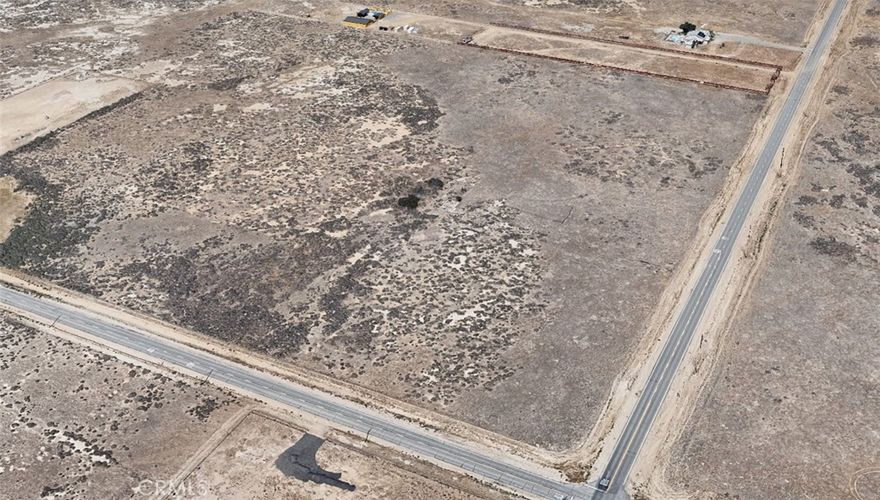 Nearly 5 acres of flat, usable land in the growing community of Lancaster! Located near Ave J & 70th St W, this parcel is just **.57 miles from the new KB Homes development**, offering both investment potential and future neighborhood growth. Enjoy open desert views, easy access to Highway 14, and close proximity to shopping, schools, and services. Great opportunity for custom home, ranch, agricultural use, or long-term hold as the Antelope Valley continues to expand. Buyer to verify zoning and utilities.