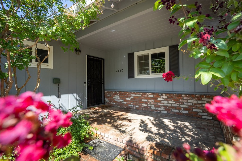 OWNED SOLAR and ROOF IS 5 YEARS OLD! Welcome to this lovely 3-bedroom, 2-bath home, perfectly situated in a sought-after neighborhood and within walking distance to Sacred Heart School. The property offers a fantastic combination of comfort, convenience, and eco-friendly features, including OWNED SOLAR system that help keep energy costs low. Wood stove in living room just in time for the holidays. Step inside to discover a bright, open kitchen that seamlessly flows into the dining area, making it an ideal space for family gatherings or entertaining. Home also includes a 2 person hot tub only a few years old. A sliding door leads directly to the good-sized, fully fenced backyard—perfect for outdoor activities, gardening, or relaxing in privacy. Roof is only 5 years old! The home also includes a 2-car garage, where you'll find additional office space and a laundry area, offering flexibility for your lifestyle needs. The front yard is nicely landscaped and fully fenced, adding both charm and security to the property. All public utilities. Dont miss out on this home!