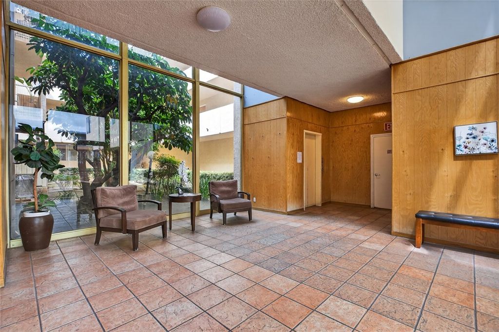 Photo of 5429 Newcastle Ave #204, Encino, CA 91316 (MLS # SR26071039)