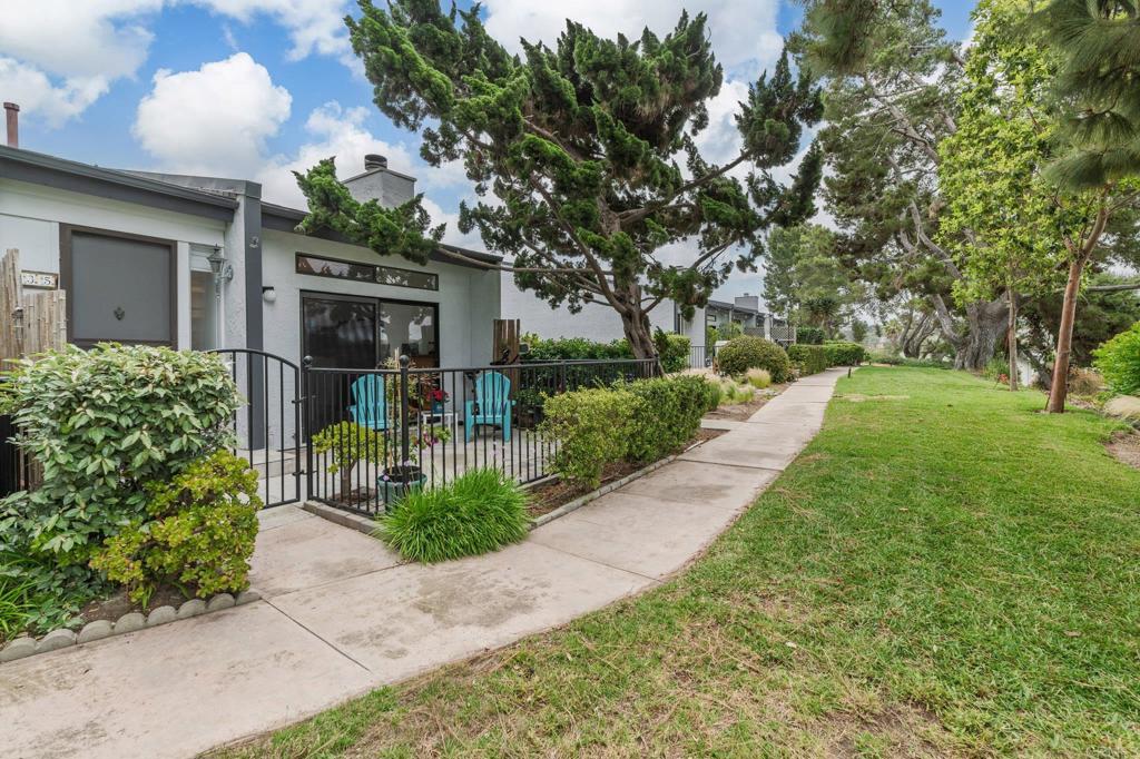 Light, bright, and ready for its next owner! This 1 bed, 1.5 bath La Costa townhouse checks all the boxes: wood-look porcelain floors, updated kitchen + baths, a cozy stone fireplace, and vaulted ceilings. Kick back on your patio with greenbelt and golf course views, perfect for sunsets and breezes. With a 2-car garage, end-unit privacy, and fresh modern upgrades, this home is stylish, comfortable, and priced to move!