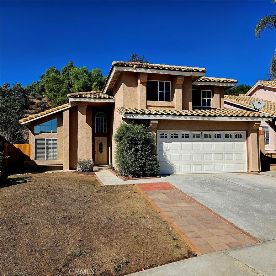 Welcome home to this spacious 4-bedroom, 2.5-bath, two-story residence offering privacy, comfort, and style. Backing to a serene hillside with no rear neighbors, this home features fresh interior paint and new luxury vinyl flooring throughout.
The modern kitchen boasts granite countertops, ample cabinetry, and a charming breakfast nook with a ceiling fan—perfect for casual dining. The kitchen opens to the bright family room, complete with a cozy fireplace, recessed lighting, and another ceiling fan. Step outside to the covered patio and newly seeded yard, ideal for outdoor entertaining or relaxing in your private setting.
Upstairs, the primary suite impresses with a vaulted ceiling accented by a beam, a decorative plant shelf, and a window seat. The en-suite bath includes a dual-sink vanity, soaking tub/shower combo, separate water closet, and a walk-in closet. The two front bedrooms enjoy hill and peekaboo city light views, and all bedrooms feature ceiling fans for year-round comfort.
Additional highlights include a new heat pump, sprinkler system, and beautiful natural surroundings. Move-in ready and designed for easy living—don’t miss this wonderful opportunity!