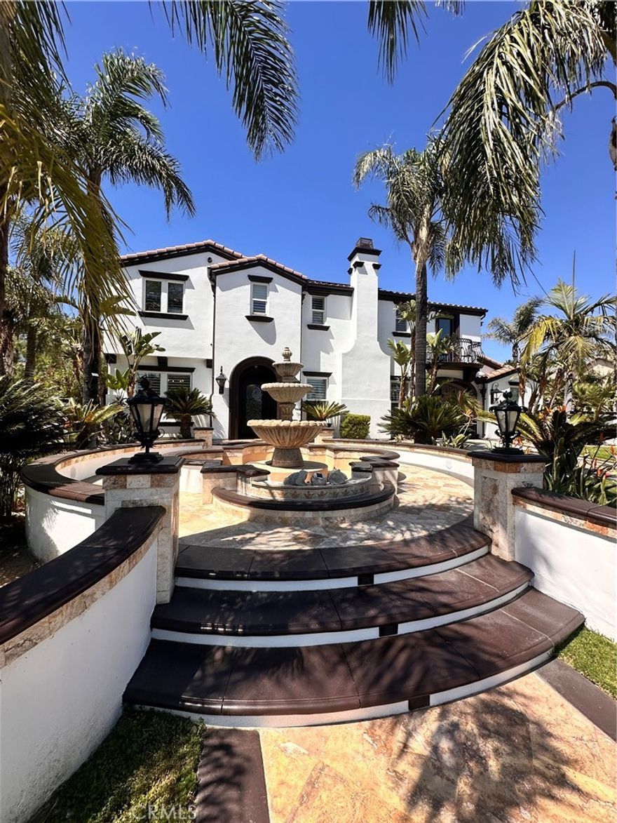 Welcome to this 5-bedroom, 5.5-bathroom luxury estate a true masterpiece, offering 5,000 square feet of meticulously updated living space inside and out. Located in the heart of Rancho Cucamonga, this stunning home combines modern sophistication with timeless elegance, perfect for both grand occasions and intimate, elegant evenings. Recently painted with a spanish style smooth finish exterior, the home boasts high-end finishes throughout. Venetian plaster ceilings, crown molding, and new light fixtures are just a few of the exquisite details that define the interior. The gourmet kitchen is every chef's dream, featuring top-of-the-line KitchenAid appliances. Every bedroom is en-suite, providing privacy and comfort for all. The home also features a newly installed HVAC system, ensuring year-round comfort. Additional upgrades include paid-off solar panels, an electric vehicle charging plug, and a lush landscape with over 50 palm trees, creating a serene and private environment.Located within distance of the highly-rated Etiwanda High School, this carriage modern estate  provides not only luxury but also convenience. Whether hosting a grand event or enjoying an elegant evening, this home offers the perfect setting for every occasion.