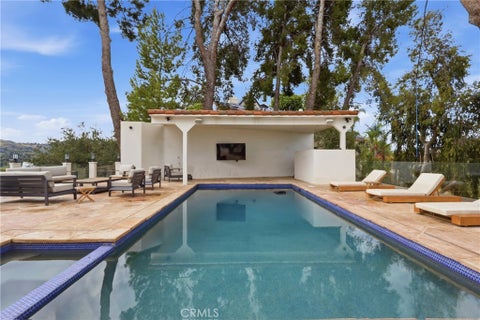 Photo of 5252 Darro Road, Woodland Hills, CA 91364 (MLS # SB26196780)