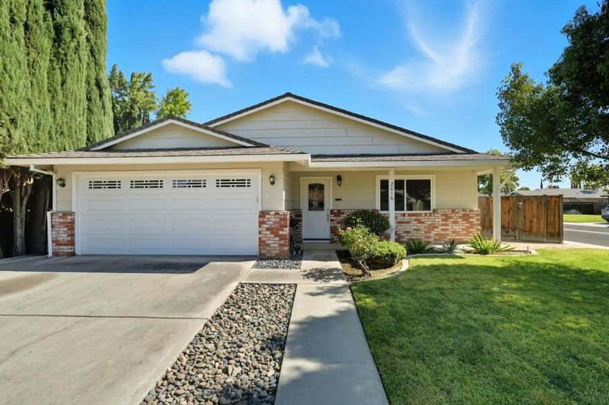 Welcome to this charming 3-bedroom, 2-bath home on a spacious corner lot in a desirable Manteca neighborhood. With 1,506 sq ft of inviting living space, this residence features a comfortable family room with a cozy wood-burning fireplace, nicely landscaped yard, and great curb appeal. Both bathrooms have been beautifully upgraded, and the floors have been updated for a fresh, modern feel. Conveniently located near parks, schools, and amenities, this wonderful property is move-in ready and waiting to welcome you home.