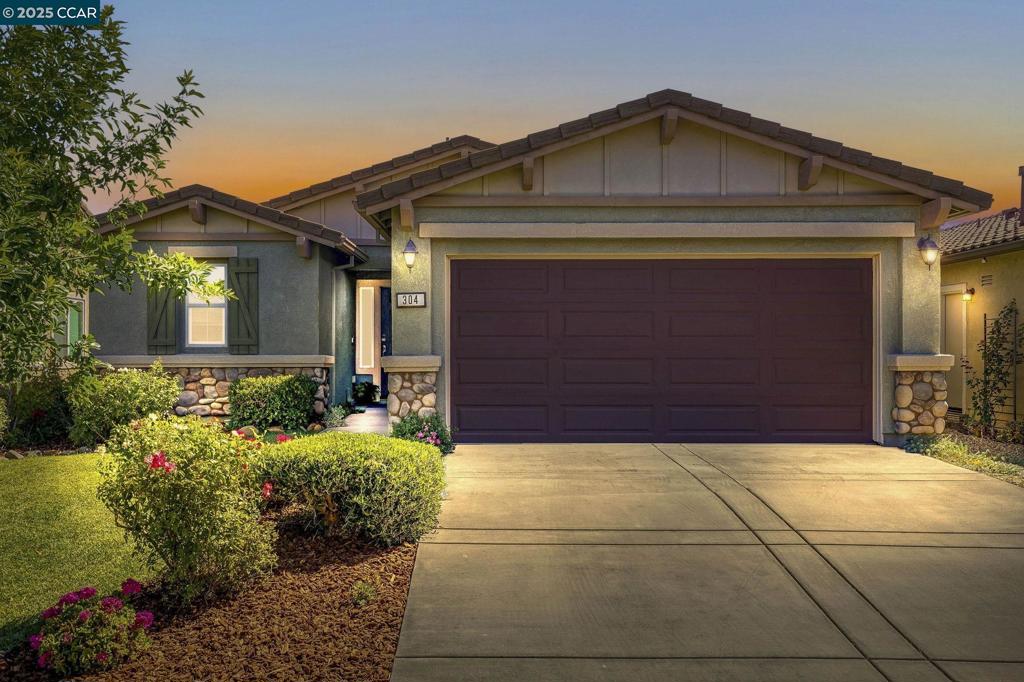 Welcome to Trilogy, a wonderful 55+ community. This charming Carmel model is sure to impress. Many recent upgrades. Gorgeous Composite luxury waterproof plank flooring throughout. Updated designer paint and other wall accents. Upgraded bathrooms with accent tile and fixtures. Beautiful rock appointed corner fireplace. Well designed and efficient kitchen space with stunning quartz countertops and breakfast bar. Upgraded appliances including induction range w Air fryer and convection oven. Ample cabinetry. Mature landscape for extra backyard and side yard privacy. Fenced yard w gate and large Patio area with lawn and garden area. Solar panels. Double car garage. So many wonderful community amenities: Indoor/Outdoor pools, Golf, Tennis, Pickle ball, Bocce ball, Restaurant, media room, library. Don't miss this one!